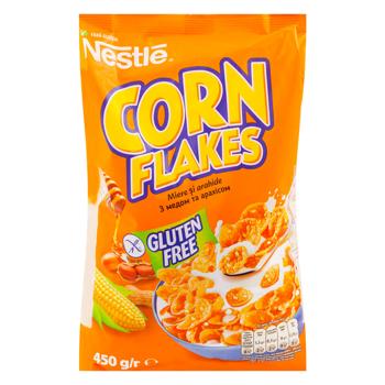 Завтрак сухой Nestle® Кукурузные хлопья с медом и арахисом 450г - купить, цены на BONUS - фото 1
